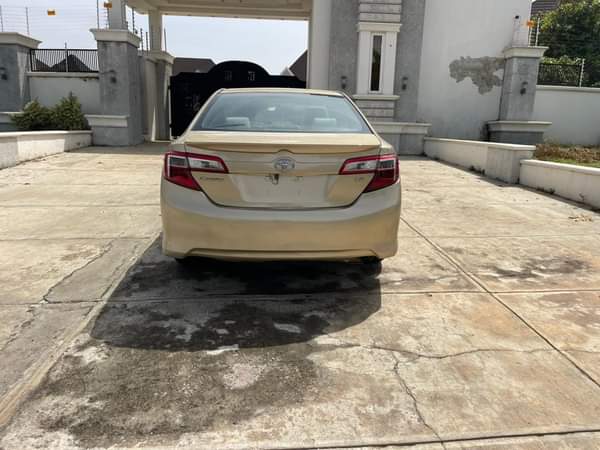 A picture of 2012 TOYOTA CAMRY LE KEYLESS FIRST BODY WITH DUTY AT