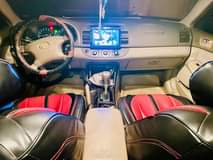 A picture of Toyota Camry 2004 4 plug Engine gear and ac are