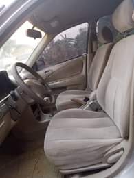 A picture of Toyota Corolla small but mighty 2001 model Everything working fine