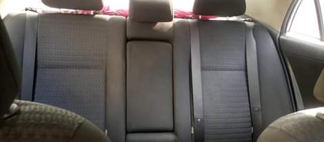 A picture of 010 Toyota Corolla brought brand new working perfectly fine manual