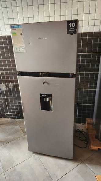 A picture of Hisense dispenser fridge 270 litres working perfectly