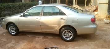 A picture of 2005 camry buy and drive with a c chilling nothing