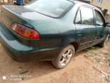 A picture of Toyota Corolla is available with good condition engine and gear