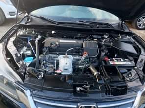 A picture of Clean toks 014 Honda accord key 4 plug engine leather