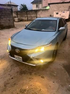 A picture of A 2011 Toyota Camry SE full options with 2024 Venza
