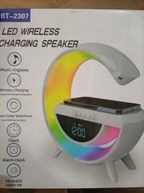 A picture of Led wireless charging Bluetooth speaker