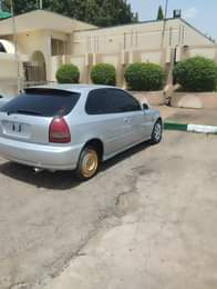 A picture of 08030813430 Extremely clean Honda civic 2000 one door automatic transmission