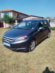 A picture of honda frv very well mantaned nothing to fix all papers