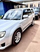 A picture of Subaru SG5 non turbo. Has projectors high beam white full