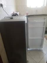 A picture of original LG fridge 190 litres and gas cooker