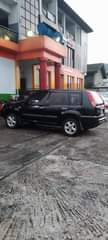 A picture of Nissan Xtrail 2011 model going for 2m settlement 100k Ac