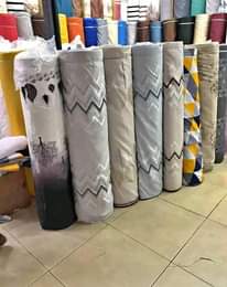 A picture of CURTAINS CURTAIN RODS CARPETS OFFICE BLINDS