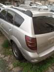 A picture of Neatly Used Pointiac Vibe 2004 Model Engine Gear very perfect