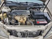 A picture of DISTRSS SALE 2004 model toyota camry LE BIG DADDY painted