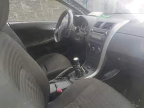 A picture of MANUAL GEAR Dealer market 2009 model Toyota Corolla Bought brand