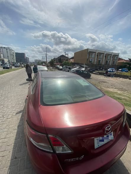A picture of Uber standard 010 Mazda available for grab Engine n gear