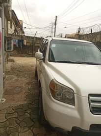 A picture of Sharp Honda pilot 2007 with a sound engine gear ac
