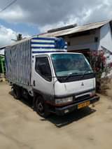 A picture of Mitsubishi Canter Engine 4d33 Price 13 5ml location kunduchi Piga