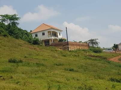 A picture of Wakiso kavumba Kona estate with titles Call watsup 0704775421 0705814256