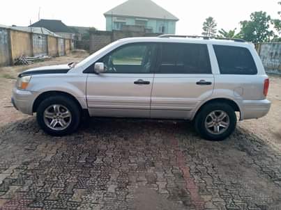 A picture of SHARP CLEAN HONDA PILOT 2004 UNTOUCHED ENGINE AND GEAR PERFECT