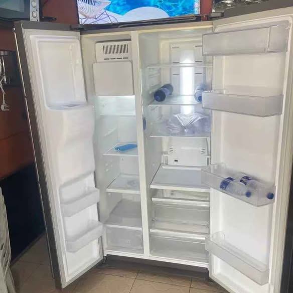 A picture of Side by side Samsung inverter fridge with water dispenser