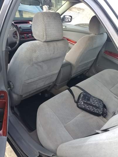 A picture of 2004 Toyota Camry painted on the first body with clean