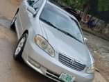 A picture of Super sharp 2004 corolla with original document now available in