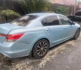 A picture of 4 plugs Honda Accord 2010 model
