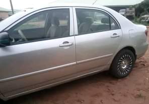 A picture of Distress Super Clean Toyota Corolla Good Engine and gear AC