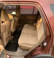 A picture of Clean Nigerian Used Wine Honda CRV 2003 Repainted Fabric interior