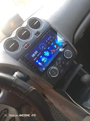 A picture of 2010 THUMB START NISSAN ALTIMA WITH ANDROID SCREEN.