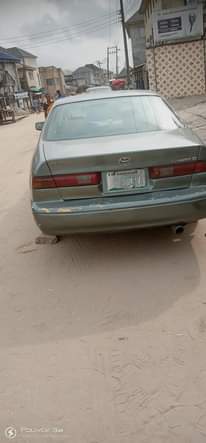 A picture of Sharp Toyota Camry AKA Tiny Light Engine AC Chilling Everything