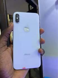 A picture of iPhone X faceid 690k working battery 100 no cracks still