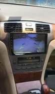 A picture of Car Android screen speakers woofers tracker and all sound system