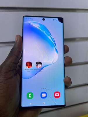 A picture of Samsung Note 10 5G 256gb storage 430k slightly cracked WhatsApp