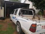 A picture of Isuzu kb 280 body on wheels with papers
