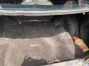 A picture of 2005 Corolla few months used neatly painted Abuja airport road