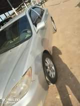 A picture of Toyota Camry 2003 LE First Body Bumper Painted 4 Plugs