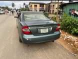 A picture of 2004 camry Ac is not good Body needs painting Engine