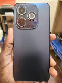 A picture of Infinix Hot 40i. 128 gb ram nyingi tu. Nipe 190k