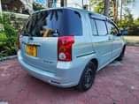 A picture of TOYOTA RAUM MODEL 2003 ENGINE 1NZ CC 1490 KM 64000