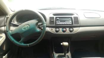 A picture of Awoof Awoof destress sales 2004 Toyota Camry Big daddy painted