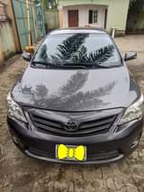 A picture of Toyota Corolla 2011 Engine untouched Gear AC Buy and drive