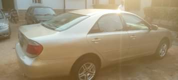 A picture of 2005 camry buy and drive with a c chilling nothing