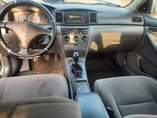 A picture of Sharp 2004 Toyota manual bank Corrolasound four plugs engine good