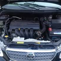 A picture of UP FOR SALE IS A CLEAN TOYOTA COROLLA 2004 MODEL