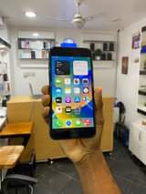 A picture of 8 Plus 64GB 100 Fingerprint 350 000 Call 0747940033