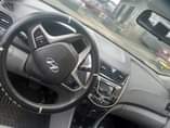 A picture of 2015 Hyundai accent Just like toks grade Engine percent Gear