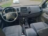 A picture of 2014 manual Toyota hilux with auxiliary gear in Abuja going