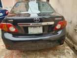 A picture of Toyota Corolla 08 painted engine gear AC perfect ok price